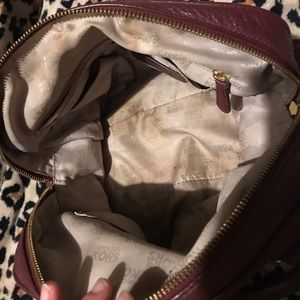 Michael Kors burgundy purse great condition no tears or rips (: